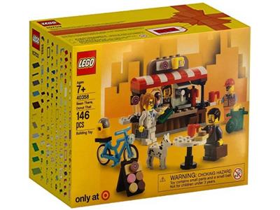 LEGO set packaging with yellow box and toy figures on a white background