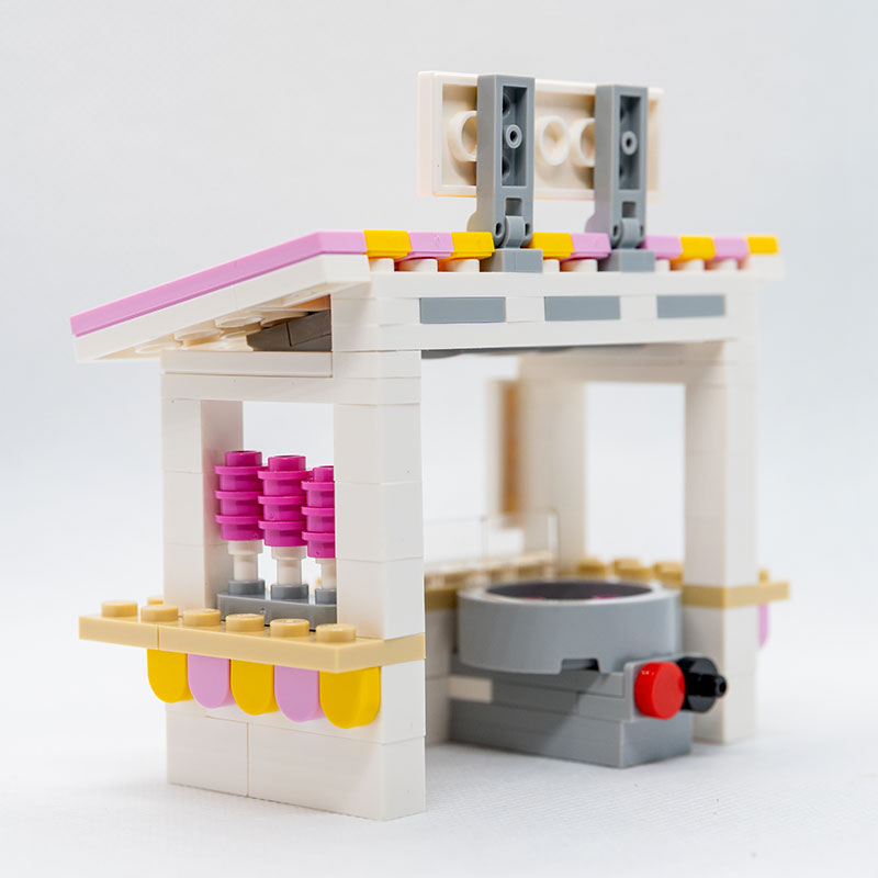 Sweet Air Cotton Candy Stand with Employee Minifig made using LEGO parts